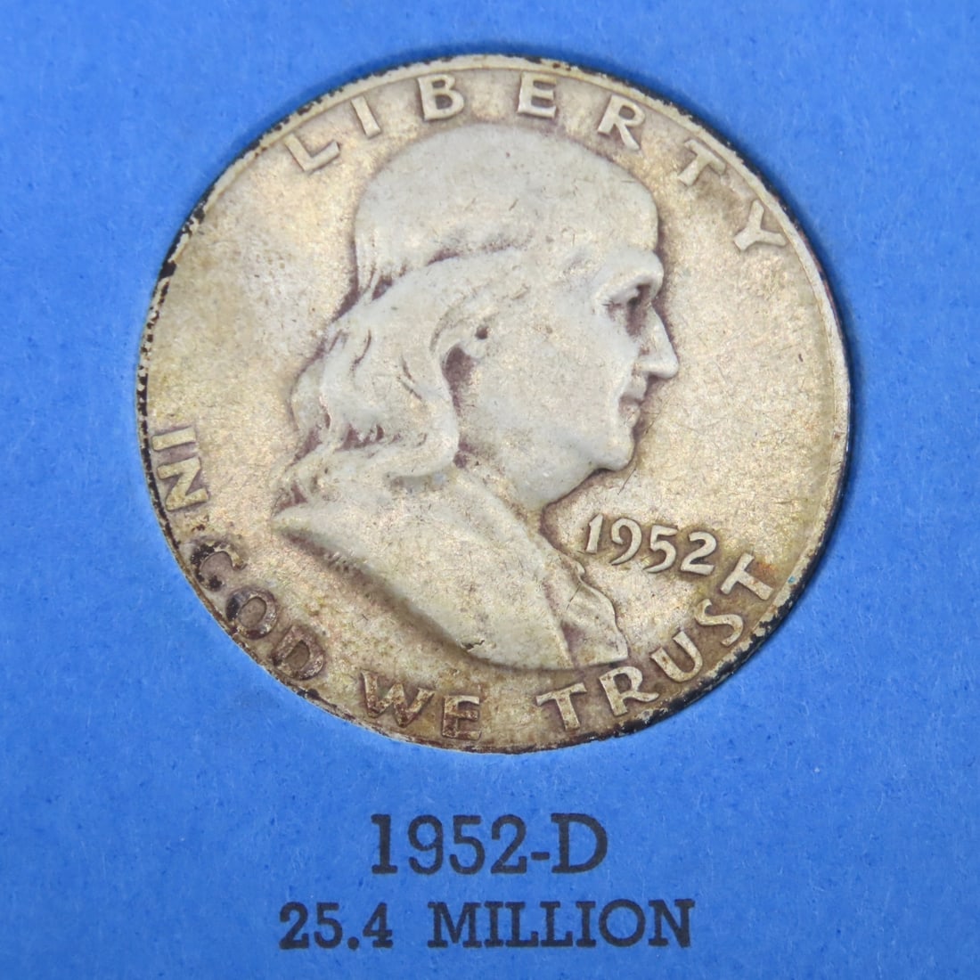 7 Franklin Silver Half Dollars in book - 4