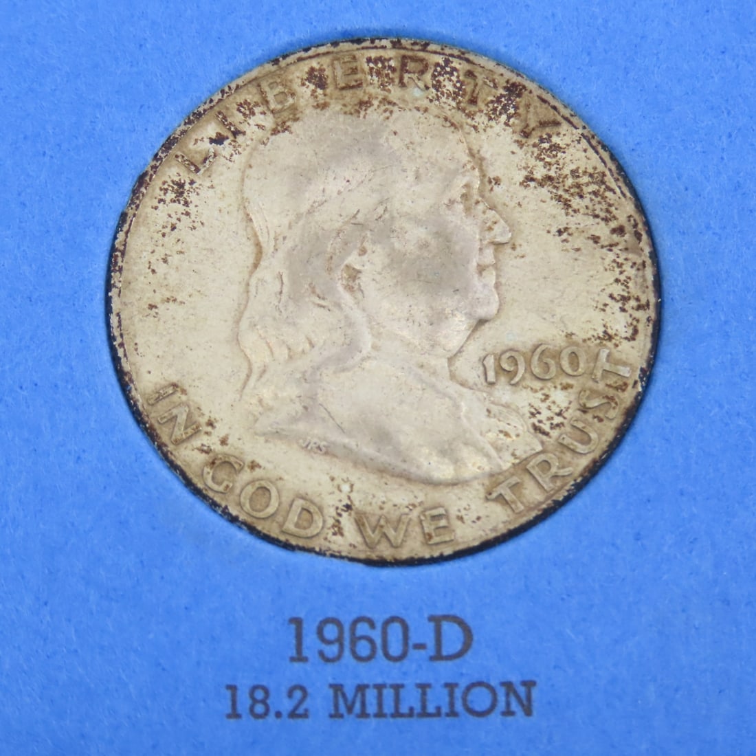 7 Franklin Silver Half Dollars in book - 8