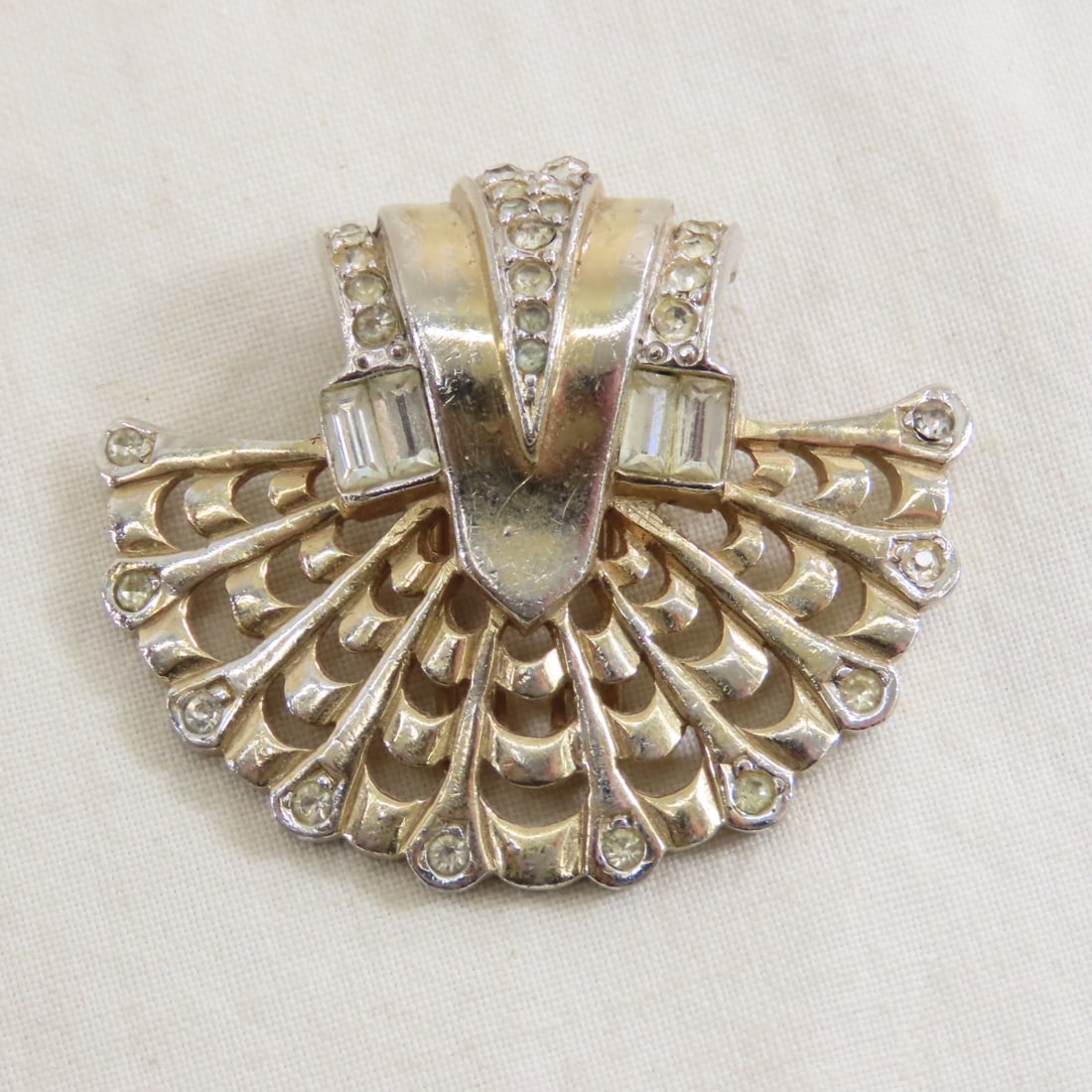 1948 Marcel Boucher Signed Fur Clip: 1948 Marcel Boucher Signed Fur Clip - no missing stones, design number 2577 78, patent No 151735. Lot size: 3x3x2", 1 oz Photos are part of description. (Live Auctioneers only shows a max of 20