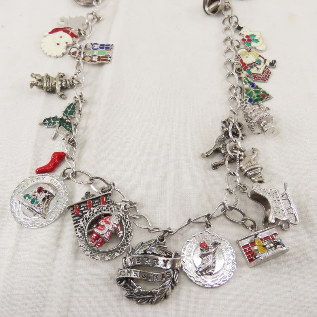 7 Charm Bracelets, 1 Xmas Charm Necklace & Charms - 12