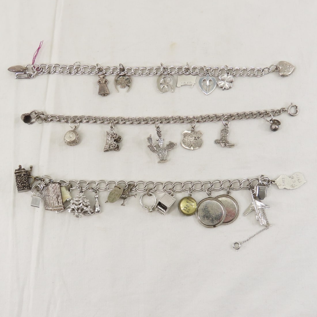 7 Charm Bracelets, 1 Xmas Charm Necklace & Charms - 7
