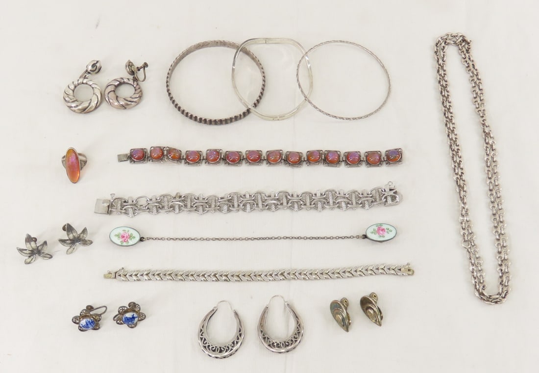 Sterling Silver Jewelry Including RMN Earrings: Sterling Silver Jewelry Including RMN Earrings - Ciani clip earrings, enamel sweater clips, Delft screw back earrings, necklace marked "(star) 133 AR"bangles, faux opal bracelet & ring, bracelets,