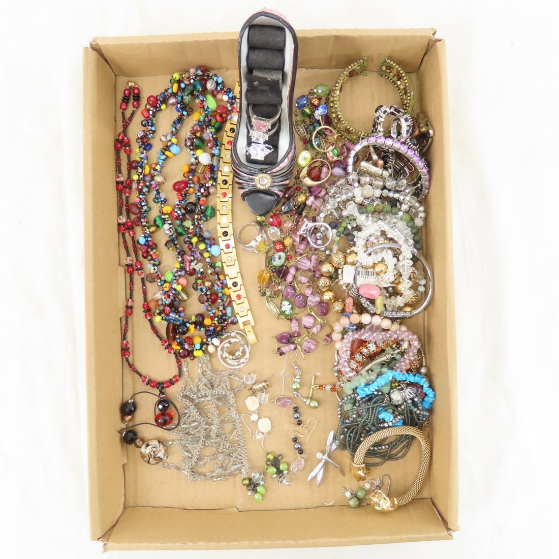Stone, Glass Bead and Other Fashion Jewelry: Stone, Glass Bead and Other Fashion Jewelry - shoe display with rings, magnetic "healing" bracelet, stretch bracelets, earrings and more. Lot size: 10x10x10" 2 lbs Photos are part of description. (Liv