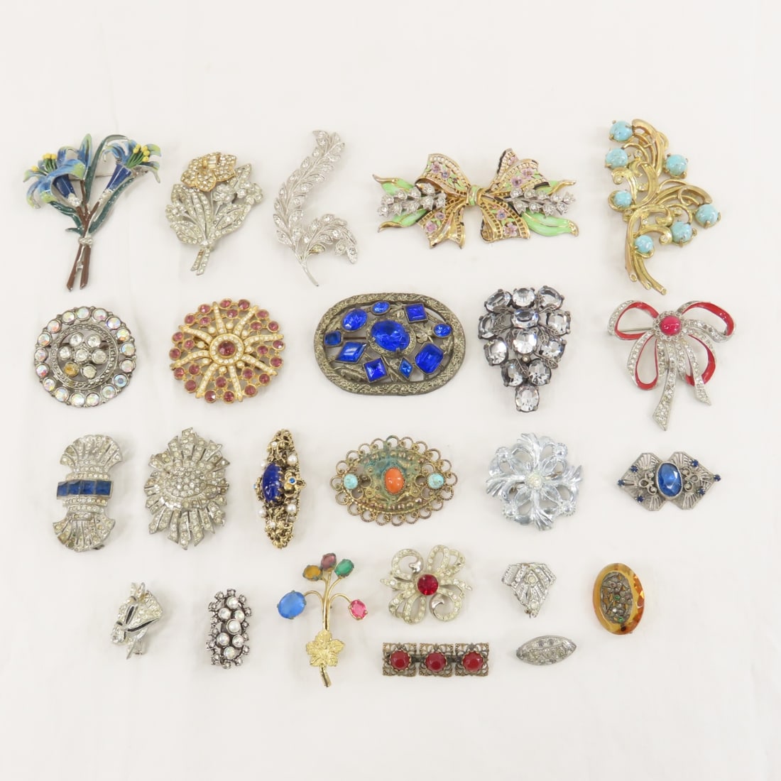 24 Antique Paste & Vintage Brooches: 24 Antique Paste & Vintage Brooches - Lo size: 9x7x5", 1 lbs Photos are part of description. (Live Auctioneers only shows a max of 20 photos). Please ask questions and read terms & conditions before