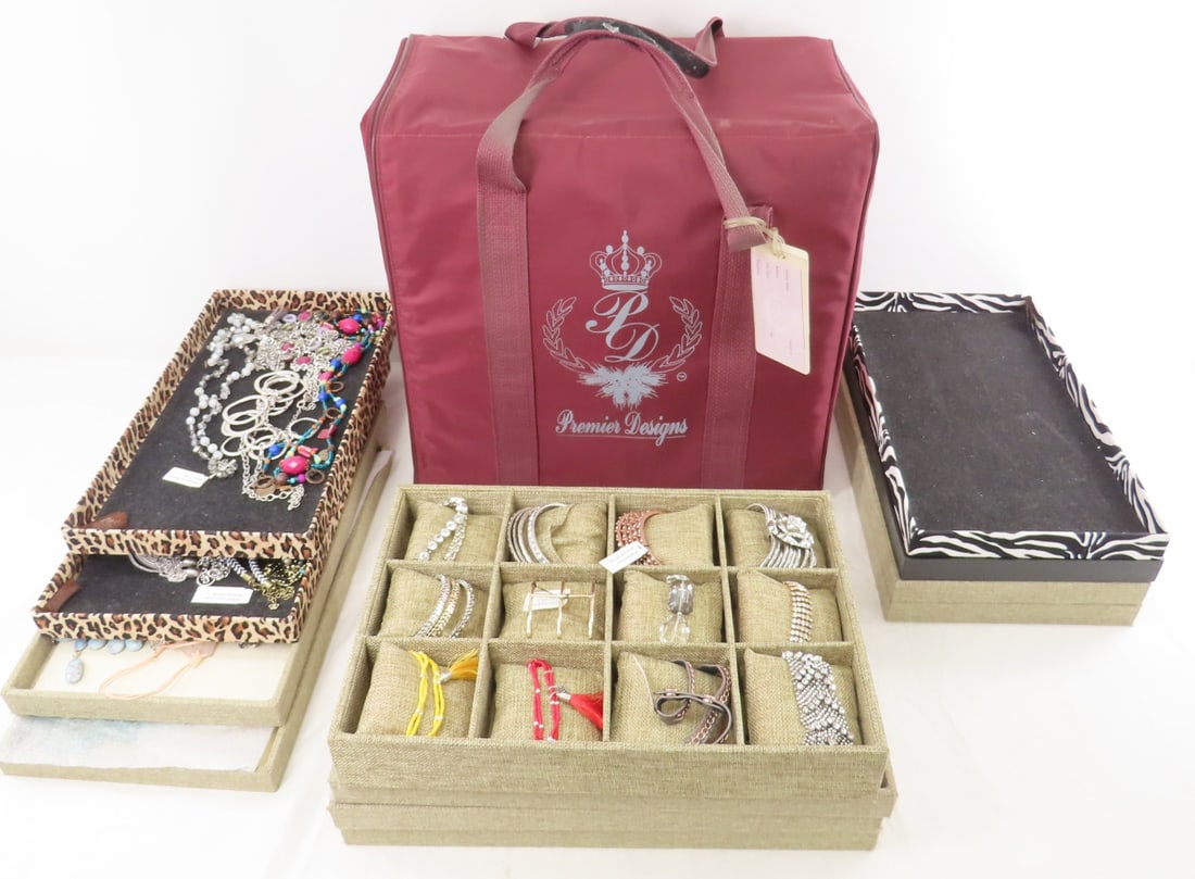 New Premiere Designs Jewelry & Displays: New Premiere Designs Jewelry & Displays - former dealer collection- 8 full trays and 4 empty- all beige & jungle print trays in Premier Designs bag. Lot size: 16x16x9", 15.9 lbs Photos are part