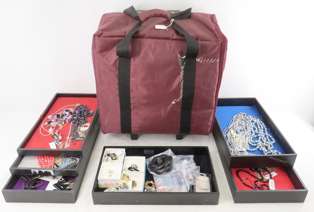 New Premiere Designs Jewelry & Displays: New Premiere Designs Jewelry & Displays - former dealer collection- 6 full trays and 2 empty- all black trays in Premier Designs rolling bag- has been repaired by strap. Lot size: 19x16x12", 16.6