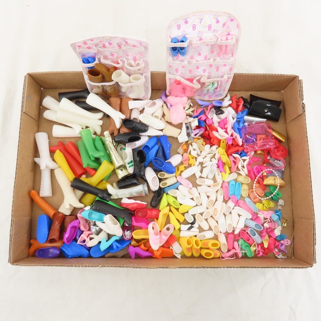 Barbie, Skipper & Other Doll Shoes, Boots & Purses: Barbie, Skipper & Other Doll Shoes, Boots & Purses - Lot size: 8x8x8", 1 lbs Photos are part of description. (Live Auctioneers only shows a max of 20 photos). Please ask questions and read terms &