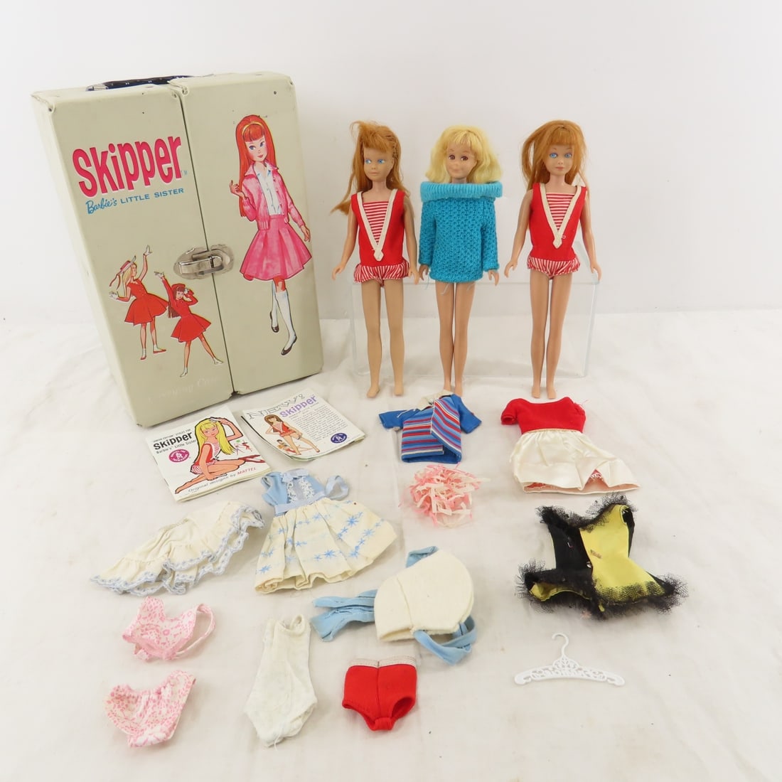 #950 & #1030 Skipper & #1040 Skooter Dolls: #950 & #1030 Skipper & #1040 Skooter Dolls - 1) #1030 Titian bend leg Skipper marked: "©1963/Mattel, Inc". 2) Skipper titian #950 Straight leg marked: "Skipper/©1963/Mattel, Inc.". Japan on