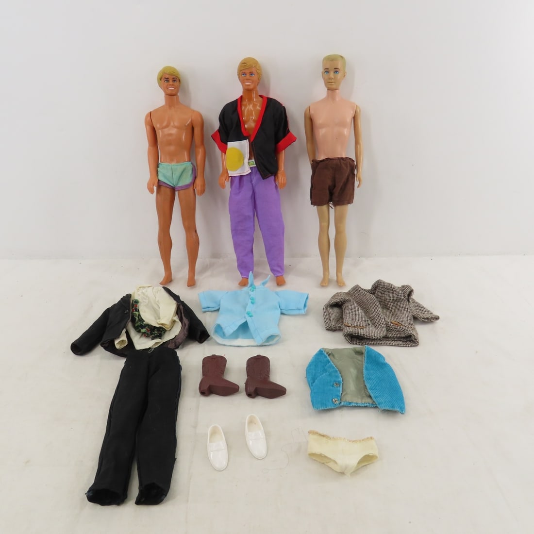 Sun Lovin' Malibu Ken, 1963 Ken: Sun Lovin' Malibu Ken, 1963 Ken - 1) 1963 blonde Ken marked: "Ken® ©1960 by Mattel, Inc. Hawthorne Calif. U.S.A."- has damaged thumbs. 2) Sun Lovin' Malibu Ken blonde marked: "1088 0500 5 &#