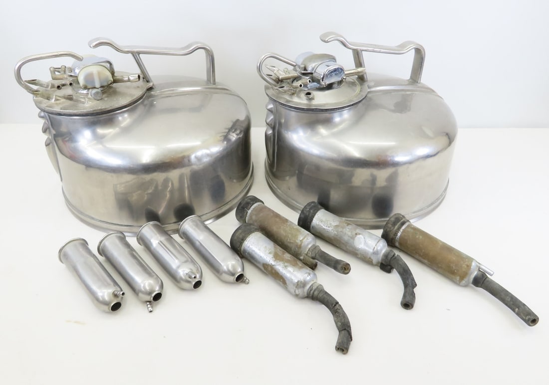 2 Vintage Universal 1700 Bucket Milkers: 2 Vintage Universal 1700 Bucket Milkers - Stainless Steel, 16" Diameter, One has Several Dents, Lot Size: 25 x 16 x 16", 35 lbs Photos are part of description. (Live Auctioneers only shows a max of