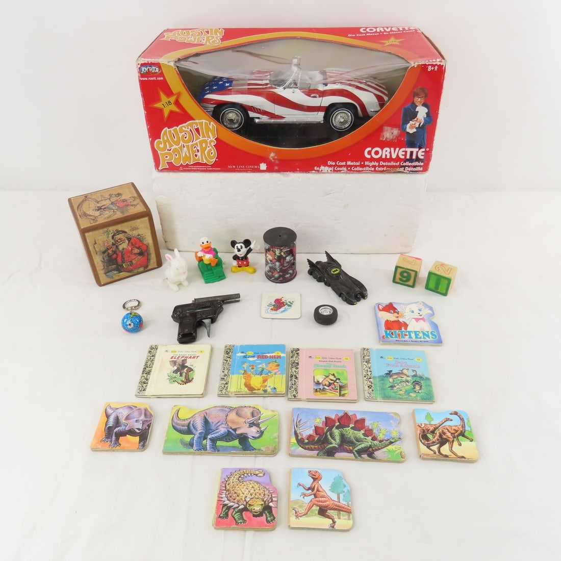 Austin Powers Crovette1:18, Mini Books & More: Austin Powers Crovette1:18, Mini Books & More - Star cap gun, and more. Austin Powers box has some damage. Lot size: 14x11x7", 4.5 lbs Photos are part of description. (Live Auctioneers only shows a