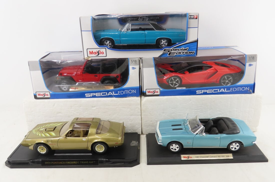 5 Diecast 1:18 Scale Maisto Cars, Firebird & Other: 5 Diecast 1:18 Scale Maisto Cars, Firebird & Other - Jeep Rubicon, Lamborghini, Pontiac GTO, Pontiac Firebird, Chevrolet Camaro. Lot Size: 16 x 15 x 14", 10 lbs Photos are part of description.