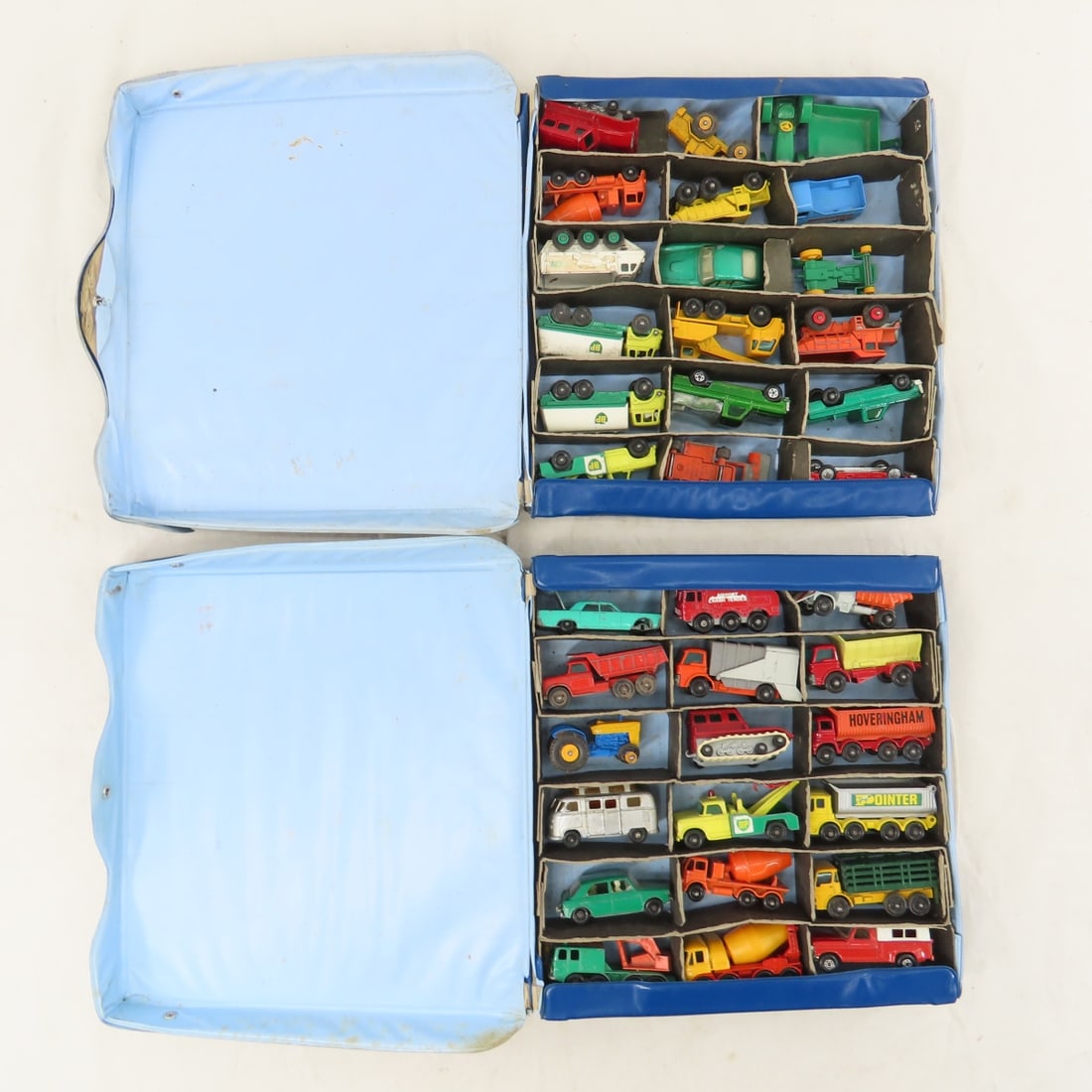 2 Vintage Matchbox Cases Full w/ Service Vehicles: 2 Vintage Matchbox Cases Full w/ Service Vehicles - BP Gas Trucks, Dump Trucks, Tractors & Cars. Lot Size: 10 x 10 x 4", 6 lbs Photos are part of description. (Live Auctioneers only shows a max of