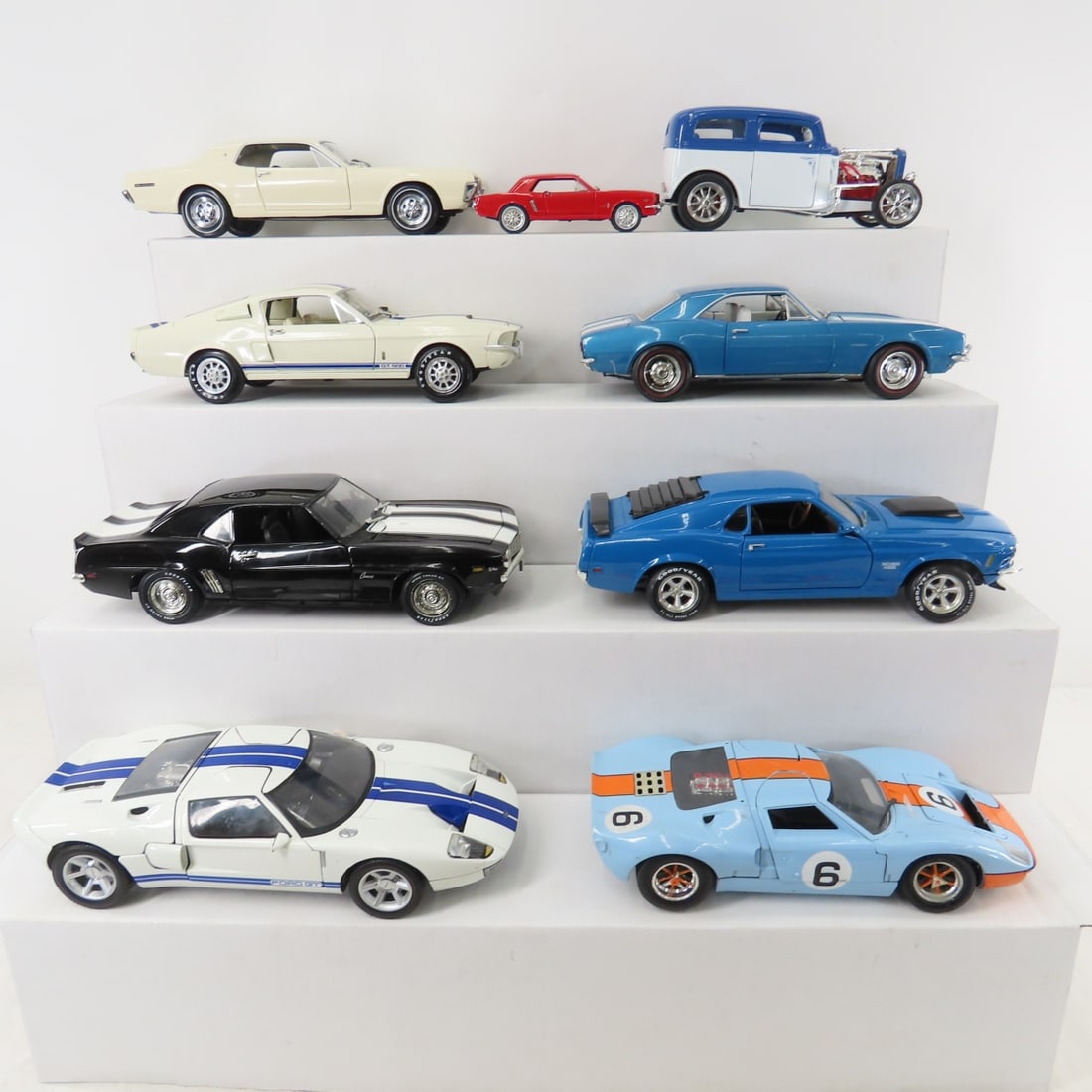 8 Ertl & Other 1:18 Scale Diecast Cars: 8 Ertl & Other 1:18 Scale Diecast Cars - Mustang, Cougar, Model A, Camaro & others, Lot Size: 18 x 14 x 10", 15 lbs Photos are part of description. (Live Auctioneers only shows a max of 20 photos).