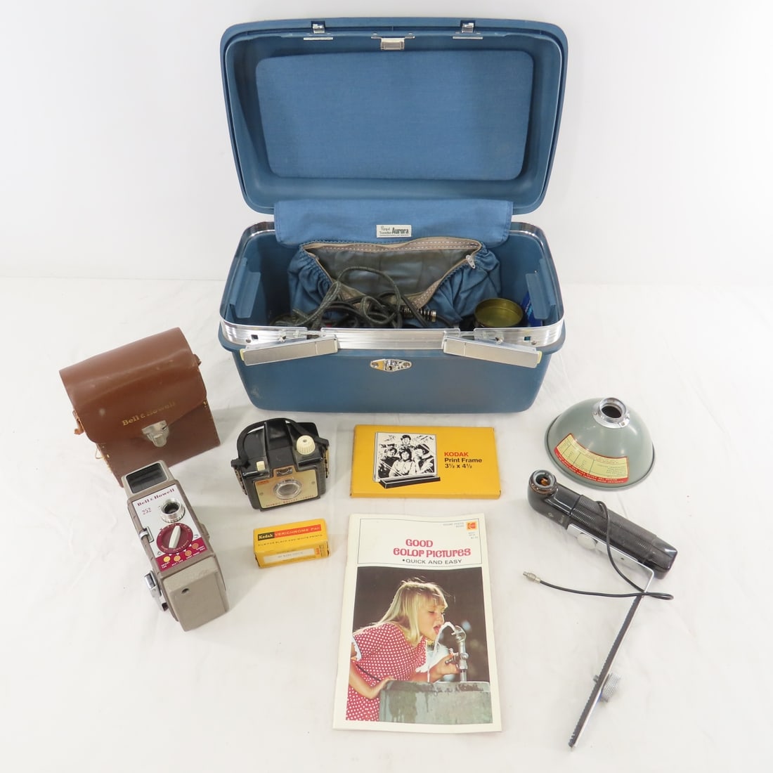 Kodak Brownie Bullet, Bell & Howell 252 8mm Camera: Kodak Brownie Bullet, Bell & Howell 252 8mm Camera - Untested: Brownie Bullet Camera, Bell & Howell 252 8mm Movie Camera and Misc. Accessories in Train Case. 14 x 9 x 8", 10 lbs Photos are part of