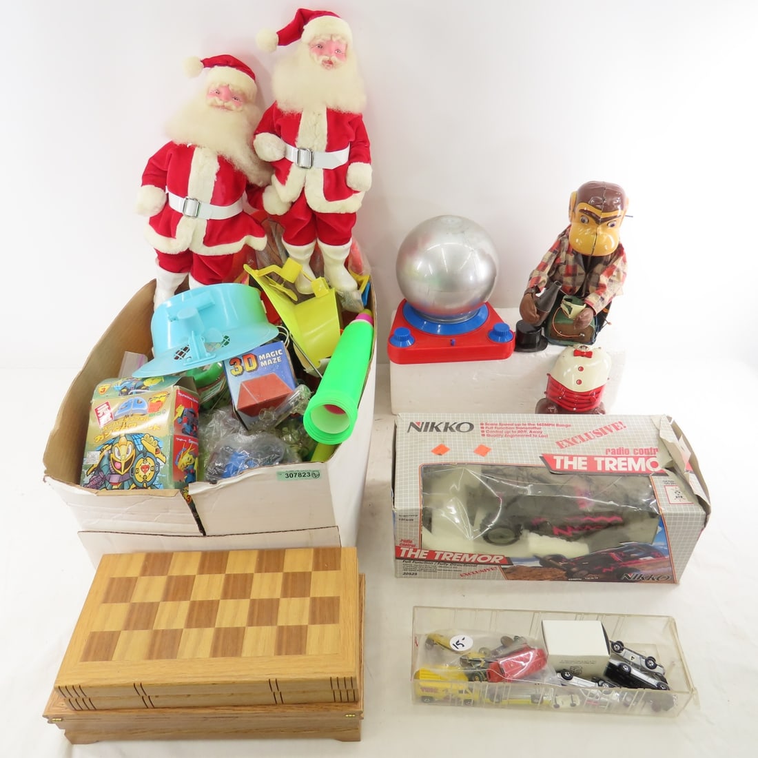 Remote Control Car, Doodle Dome, Santas & More: Remote Control Car, Doodle Dome, Santas & More - Lot Size: 20 x 18 x 12", 20 lbs Photos are part of description. (Live Auctioneers only shows a max of 20 photos). Please ask questions and read terms &