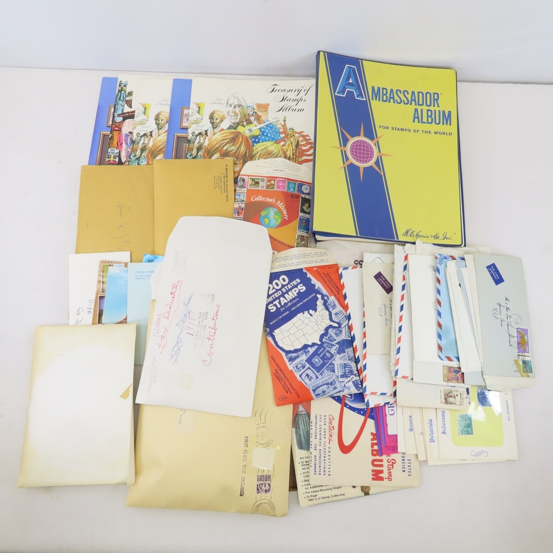 US & Foreign Stamps & Books, Postcards & More: US & Foreign Stamps & Books, Postcards & More - Photos are part of description. (Live Auctioneers only shows a max of 20 photos). Please ask questions and read terms & conditions before bidding.