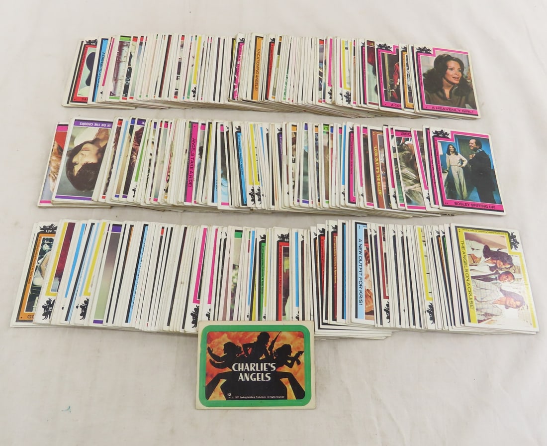 250+ 1970's Charlie's Angel Cards: 250+ 1970's Charlie's Angel Cards - mixed condition. 7x5x4", 1.7 lbs Photos are part of description. (Live Auctioneers only shows a max of 20 photos). Please ask questions and read terms & conditions