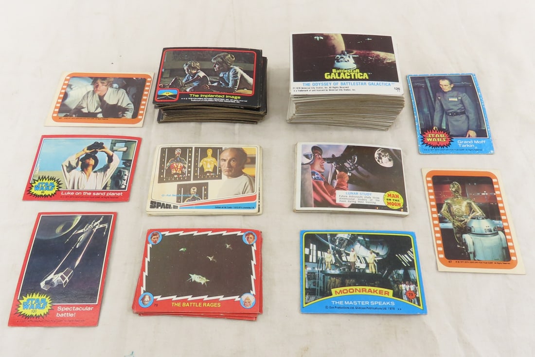 Battlestar Galactica & Other Sci-Fi Trading Cards: Battlestar Galactica & Other Sci-Fi Trading Cards - 2001 Space Odyssey, Star Wars, Moonraker, Space 1999, Man on the Moon, and Buck Rogers, some picture backs- mixed condition. Lot size: 5x4x4", 1 lb
