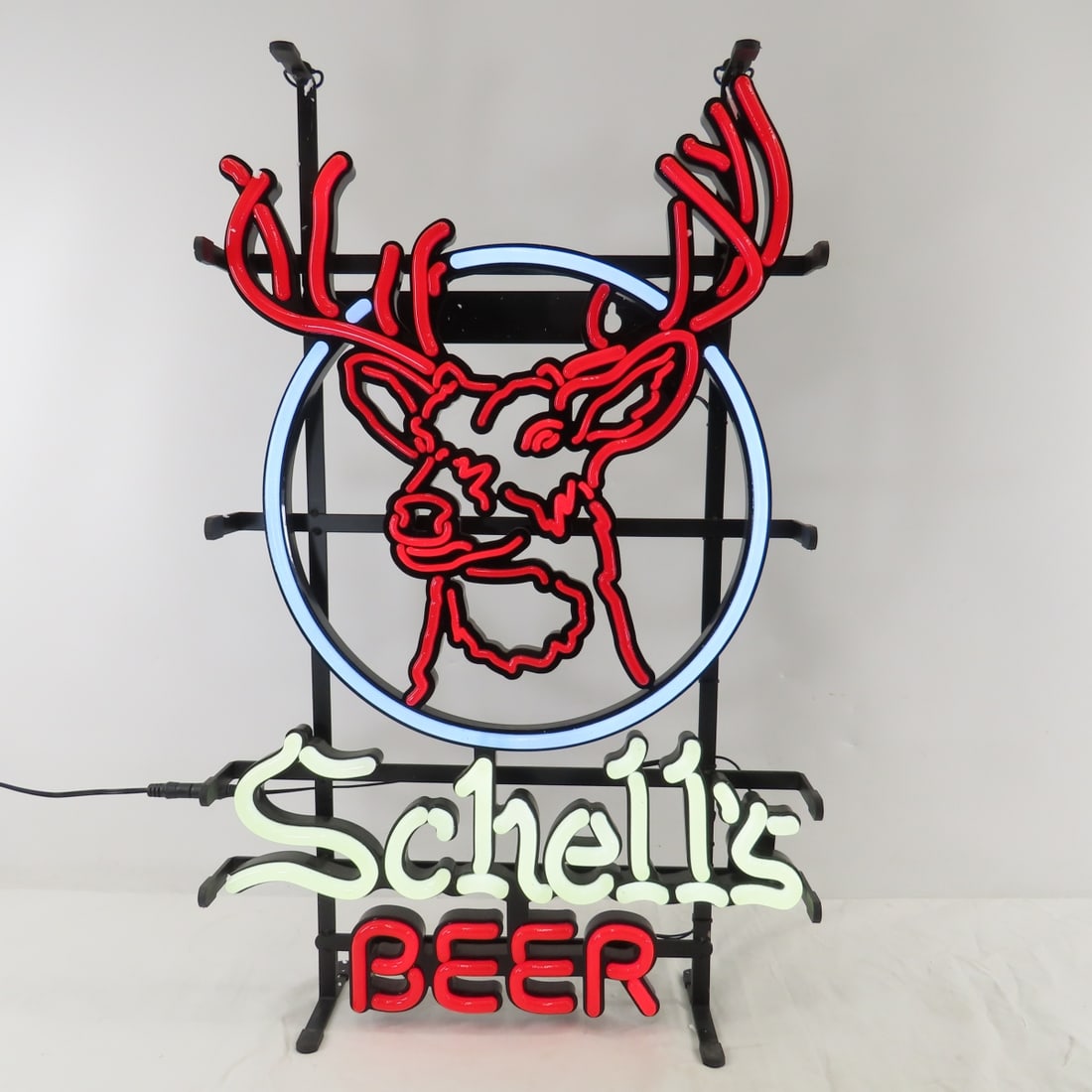 Schell's Beer Deer Head LEDNEON Bar Light, Working: Schell's Beer Deer Head LEDNEON Bar Light, Working - Light: 24 x 15". Lot Size: 26 x 18 x 5", 8 lbs Photos are part of description. (Live Auctioneers only shows a max of 20 photos). Please ask