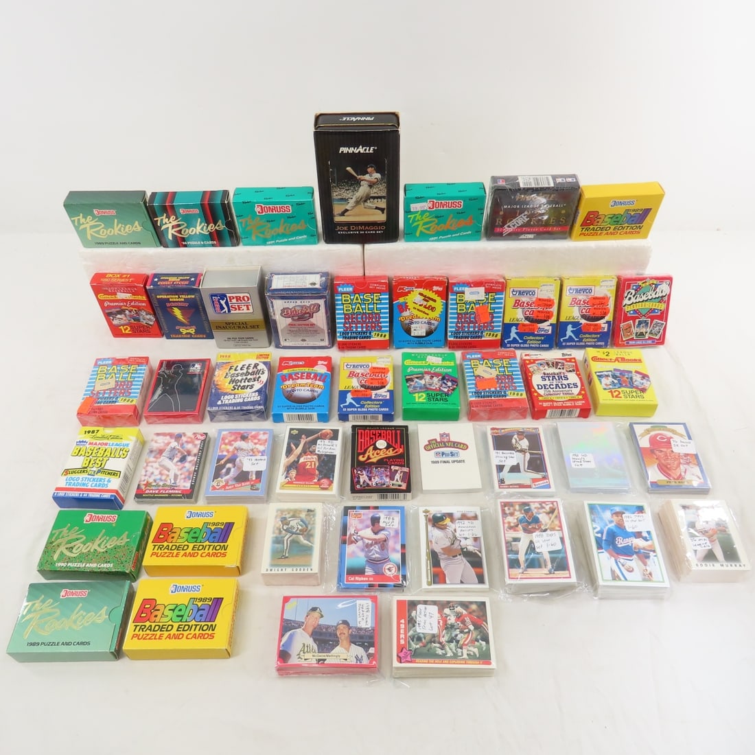 40+ Baseball Card Sets, many sealed: 40+ Baseball Card Sets, many sealed - Lot Size 10x10x10" 10 LB Photos are part of description. (Live Auctioneers only shows a max of 20 photos). Please ask questions and read terms & conditions before