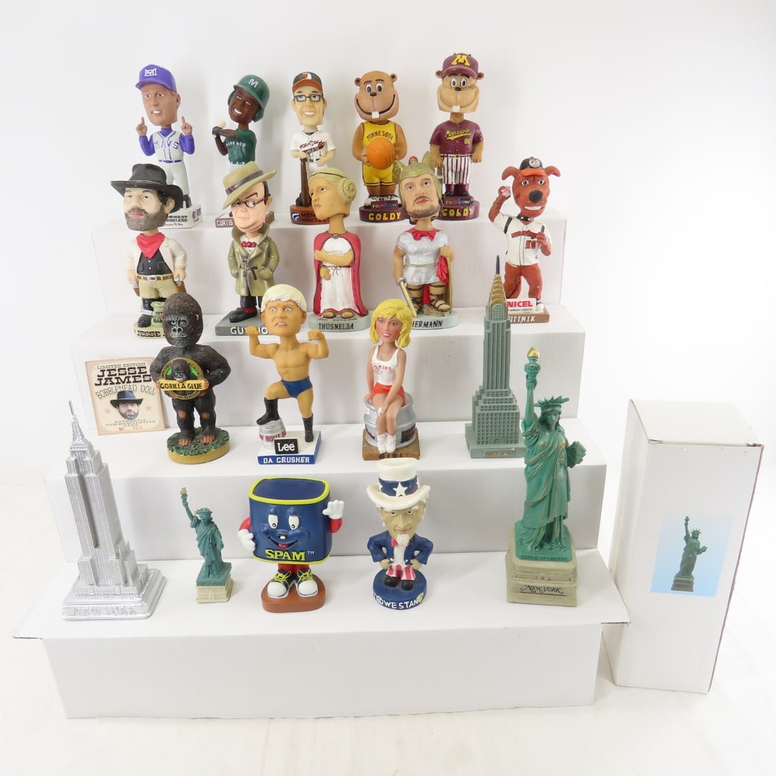 15 Bobble Head Nodders & New York Souvenirs: 15 Bobble Head Nodders & New York Souvenirs - Minnesota Gophers, Da Crusher Wrestler, Uncle Sam, Hooters Girl, Gorilla Glue (chipped), Garrison Keillor, Jesse James, SPAM and Others. Some Heads need R