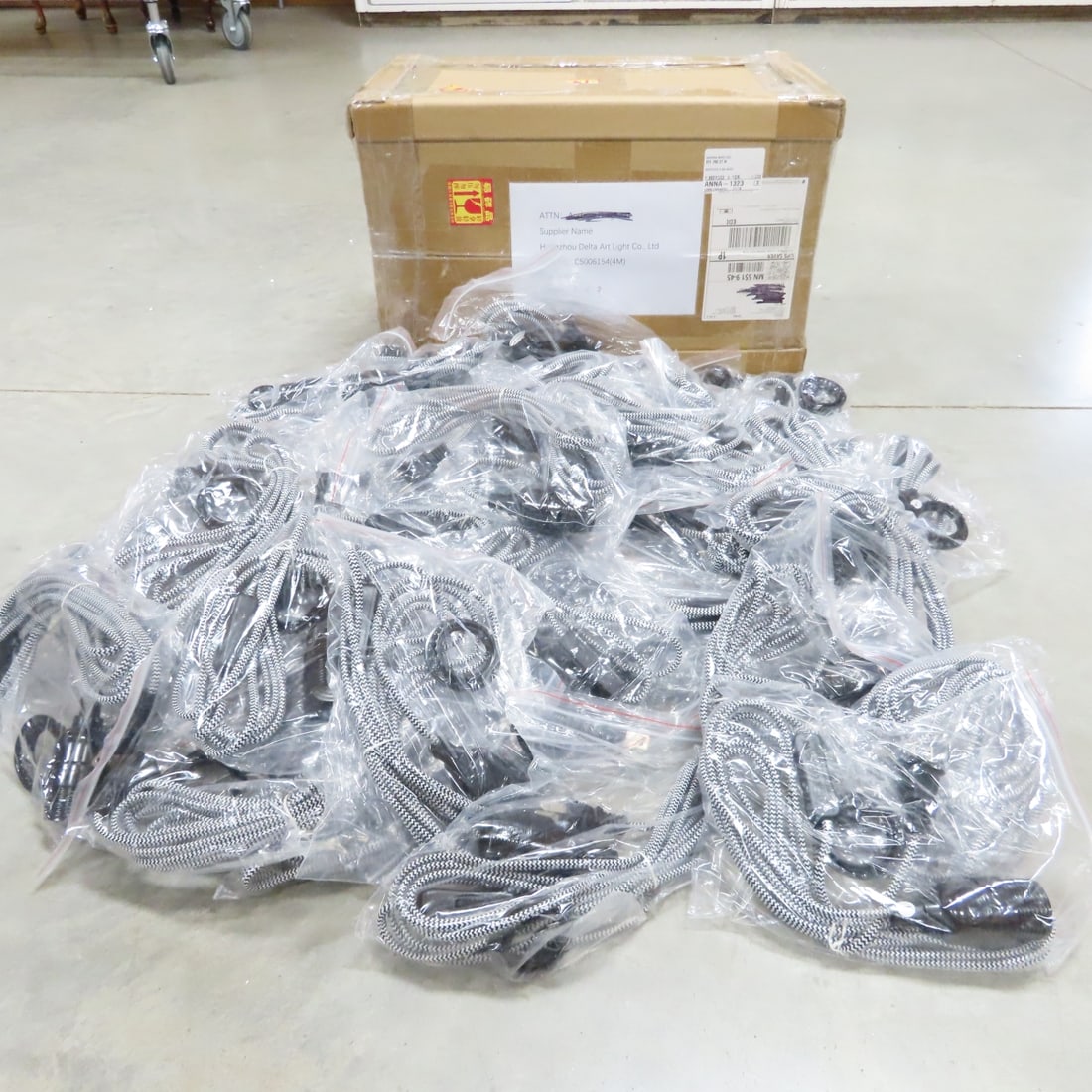 46 Kema Keur12 ft Braided Pendant Light Cords: 46 Kema Keur12 ft Braided Pendant Light Cords - 50 New 12 ft Braided AC Pendant Light Cords with 250V 3A On/Off Switch, MFG Number C5006154(4M). Lot Size: 20 x 11 x 13", 30 lbs Photos are part of