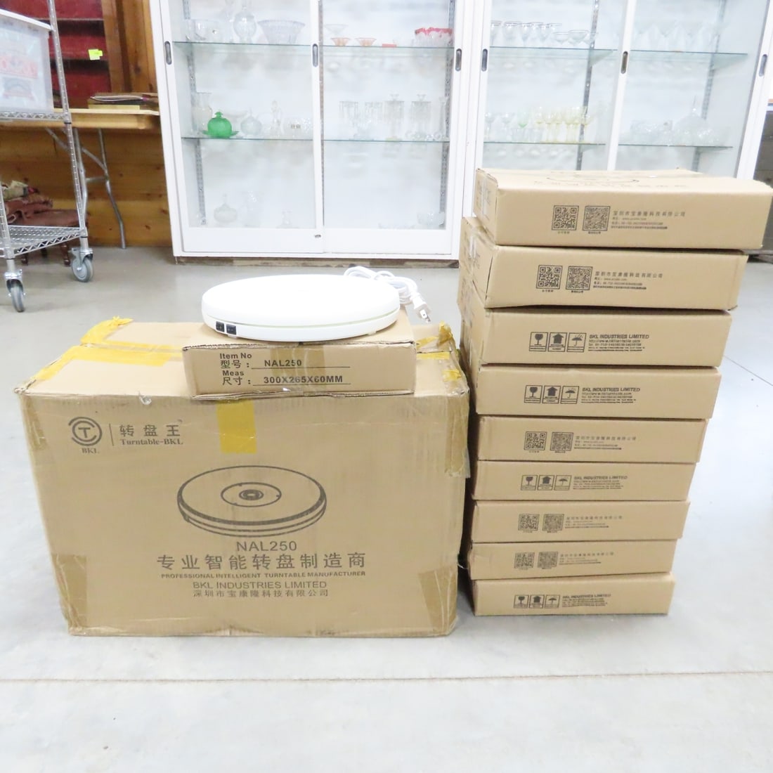 10 White NAL250 Rotating 10" Display Stand w/LED: 10 White NAL250 Rotating 10" Display Stand w/LED - New in Original Packaging, Steady Rotation, LED Light, Up to 20 lb Load Capacity. Lot Size: 22 x 13 x 15", 23 lbs Photos are part of description.