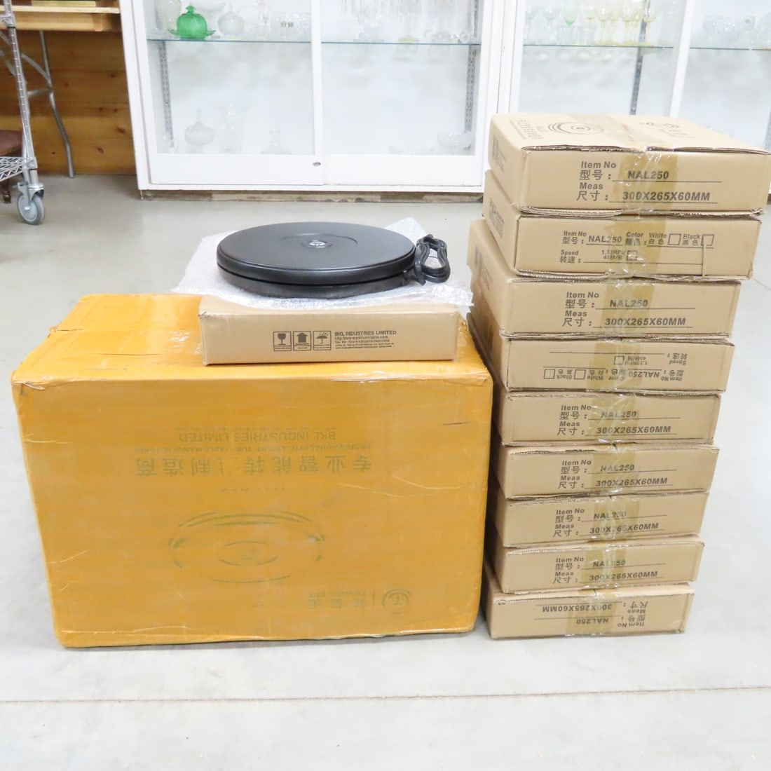 10 Black NAL250 Rotating 10" Display Stand w/LED: 10 Black NAL250 Rotating 10" Display Stand w/LED - New in Original Packaging, Steady Rotation, LED Light, Up to 20 lb Load Capacity. Lot Size: 22 x 13 x 15", 23 lbs Photos are part of description. (Li