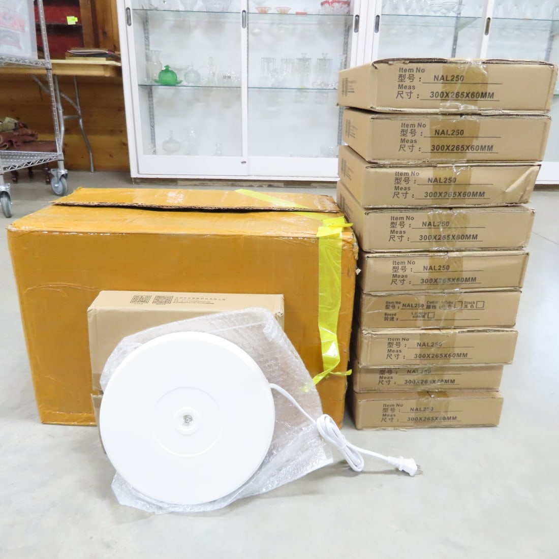 10 White NAL250 Rotating 10" Display Stand w/LED: 10 White NAL250 Rotating 10" Display Stand w/LED - New in Original Packaging, Steady Rotation, LED Light, Up to 20 lb Load Capacity. Lot Size: 22 x 13 x 15", 23 lbs Photos are part of description. (Li