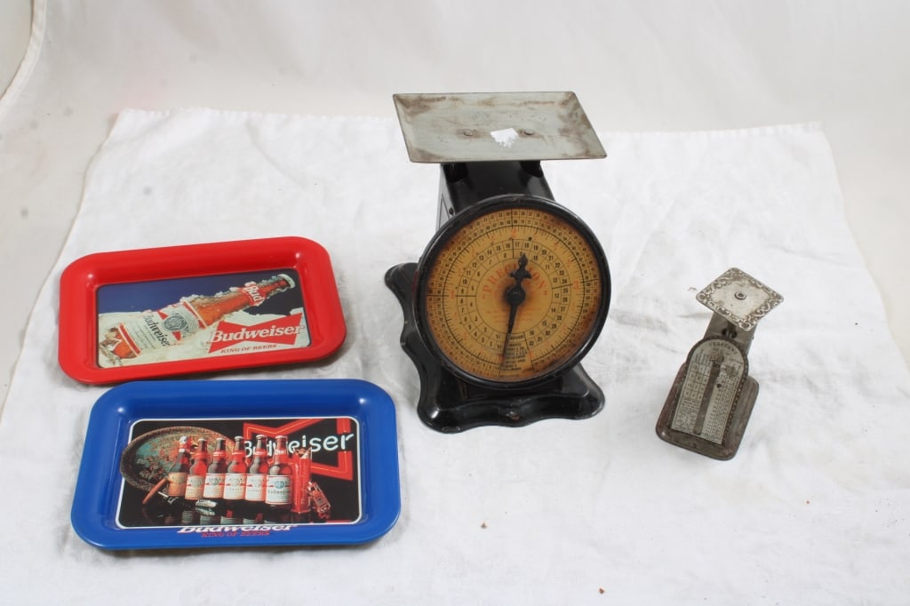 2 Antique Postal Scales, 2 Budweiser Beer Tip Tray: 2 Antique Postal Scales, 2 Budweiser Beer Tip Tray - 1900's Antique Postage Scales by Crescent (missing pointer) & Triner makers and 2 1996 Budweiser Beer Tip Trays. Lot Size 8" x 8" x 8". 2