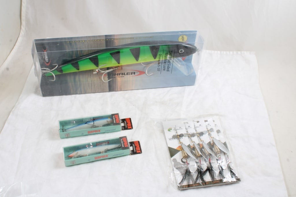 Inhaler Lure, Spoon Spinners, 2 Rapala Lures: Inhaler Lure, Spoon Spinners, 2 Rapala Lures - All are new in packaging. Lot Size 14" x 6" x 5". 1 Lb. Photos are part of description (Live Auctioneers on displays a max of 20 photos -check other