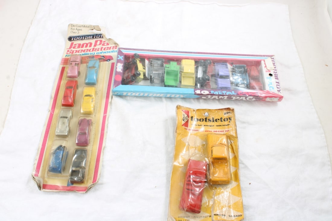Vintage Tootsietoy Cars New on Cards: Vintage Tootsietoy Cars New on Cards - Lot Size 12" x 5" x 4". 1 Lb. Photos are part of description (Live Auctioneers on displays a max of 20 photos -check other polatforms for all photos). Please