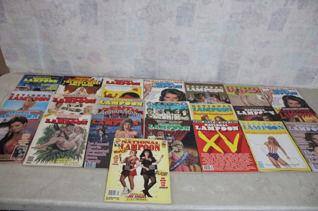 22 National Lampoon Magazines 1980's & 90's: 22 National Lampoon Magazines 1980's & 90's - Mainly 1980's. The Dirty Joke Book & Others. Lot Size 11" x 8" x 4". 10 Lbs. Photos are part of description (Live Auctioneers on displays a max of