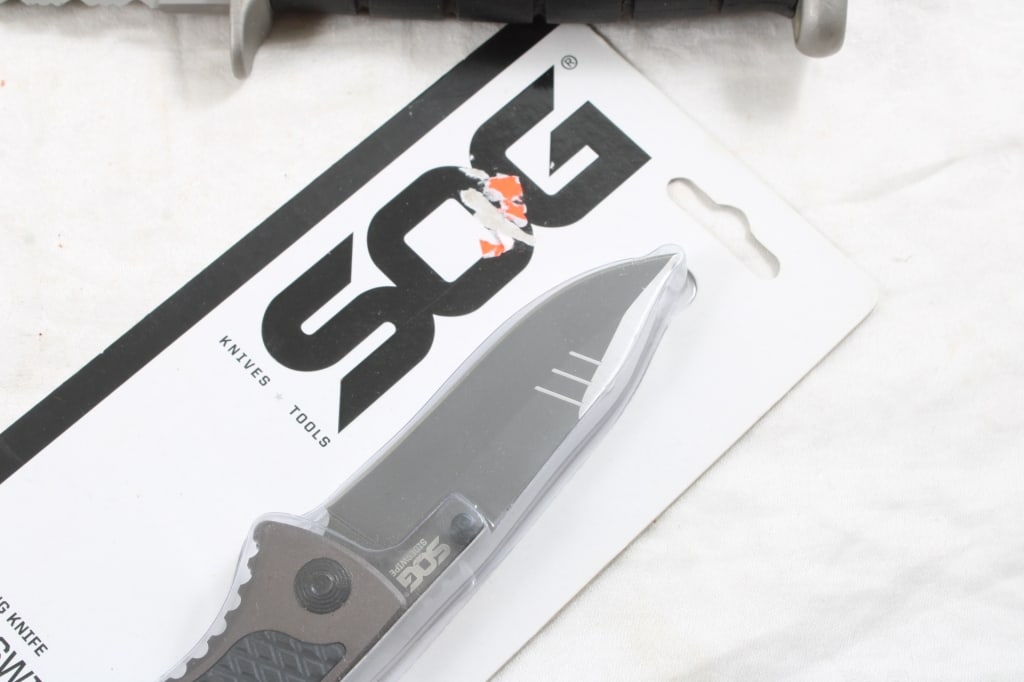 2 Knives 1 SOG New in Package, 1 Tanto in Sheath - 2