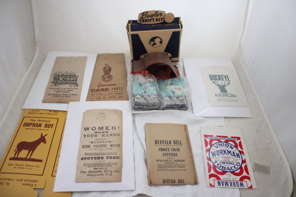Bugler Cigarette Rolling Machine in Box & More: Bugler Cigarette Rolling Machine in Box & More - Tobacco Advertising Bags Buckeye Buffalo Bill Workman Orphan Boy, Case Implement Bag, Stovene Mittens and X-Ray Stove Polish Bag. Lot Size 12"