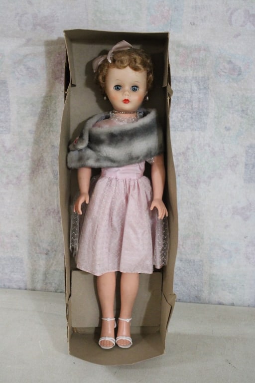 1956 Ideal Miss Revlon 22" Doll in Box with Fur: 1956 Ideal Miss Revlon 22" Doll in Box with Fur - Lot Size 25" x 8" x 5". 3 Lbs. Photos are part of description (Live Auctioneers on displays a max of 20 photos -check other polatforms for all