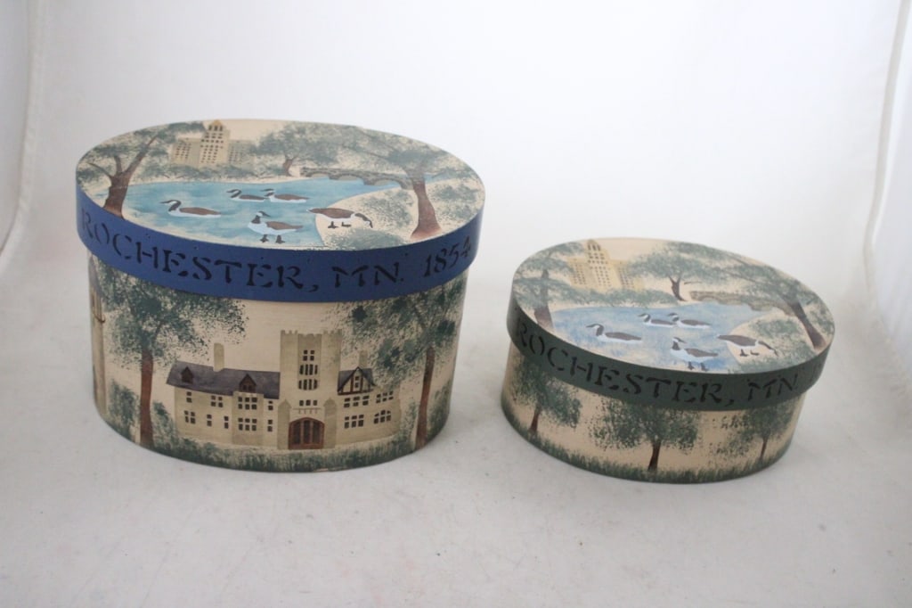 2 Rochester MN Souvenir Wood Boxes: 2 Rochester MN Souvenir Wood Boxes - Scenes of Rochester City Scape with Geese & Silver Lake. Lot Size 12" x 12" x 10". 3 Lbs. Photos are part of description (Live Auctioneers on displays a max