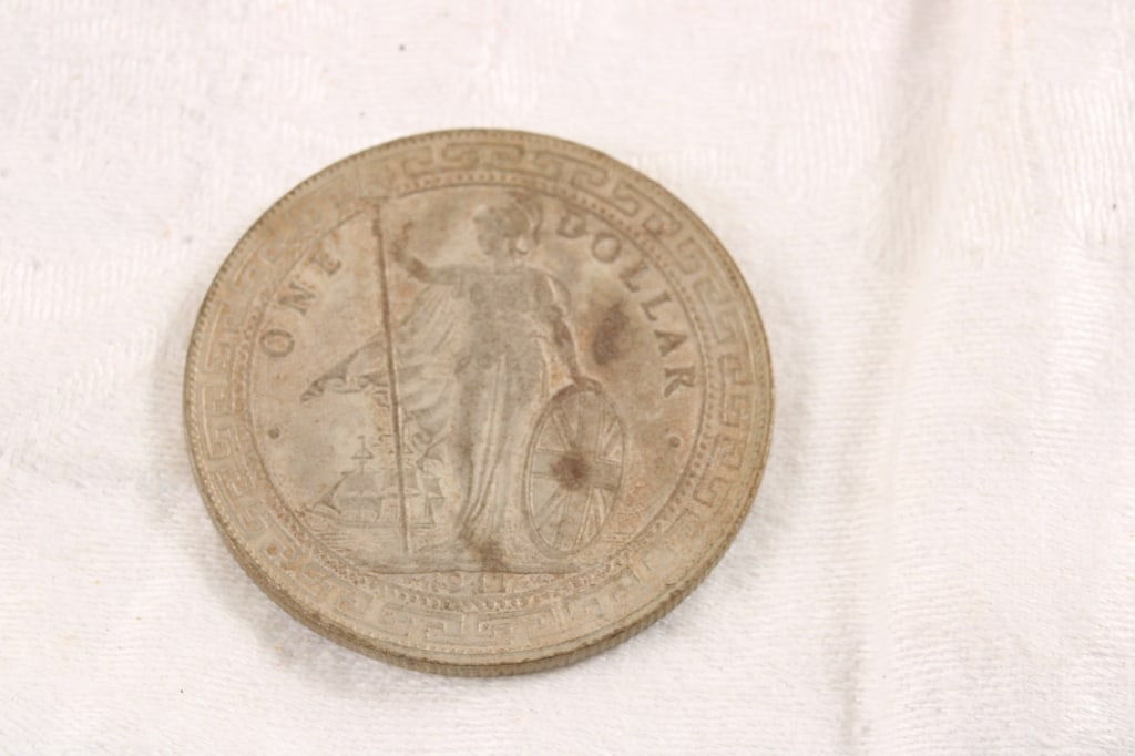 1911 Great Britain Trade Silver Dollar: 1911 Great Britain Trade Silver Dollar - Lot Size 3" x 3" x 1". 1 Lb. Photos are part of description (Live Auctioneers on displays a max of 20 photos -check other polatforms for all photos). Please