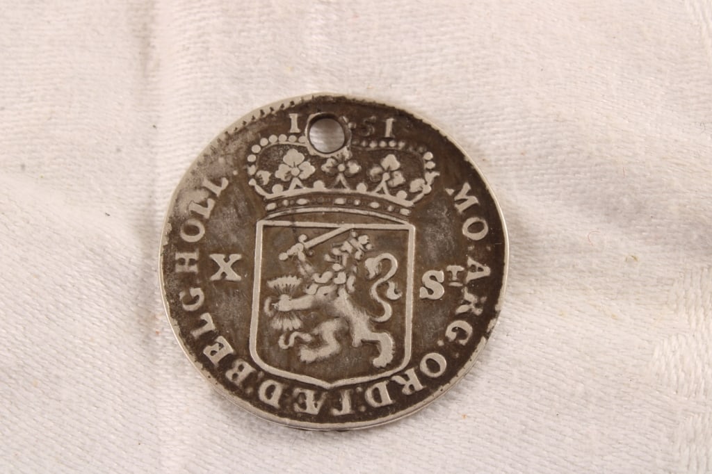 1751 Netherlands Holland 10 Stivers Silver Coin: 1751 Netherlands Holland 10 Stivers Silver Coin - Lot Size 2" x 2" x 1". 1 lb. Photos are part of description (Live Auctioneers on displays a max of 20 photos -check other polatforms for all