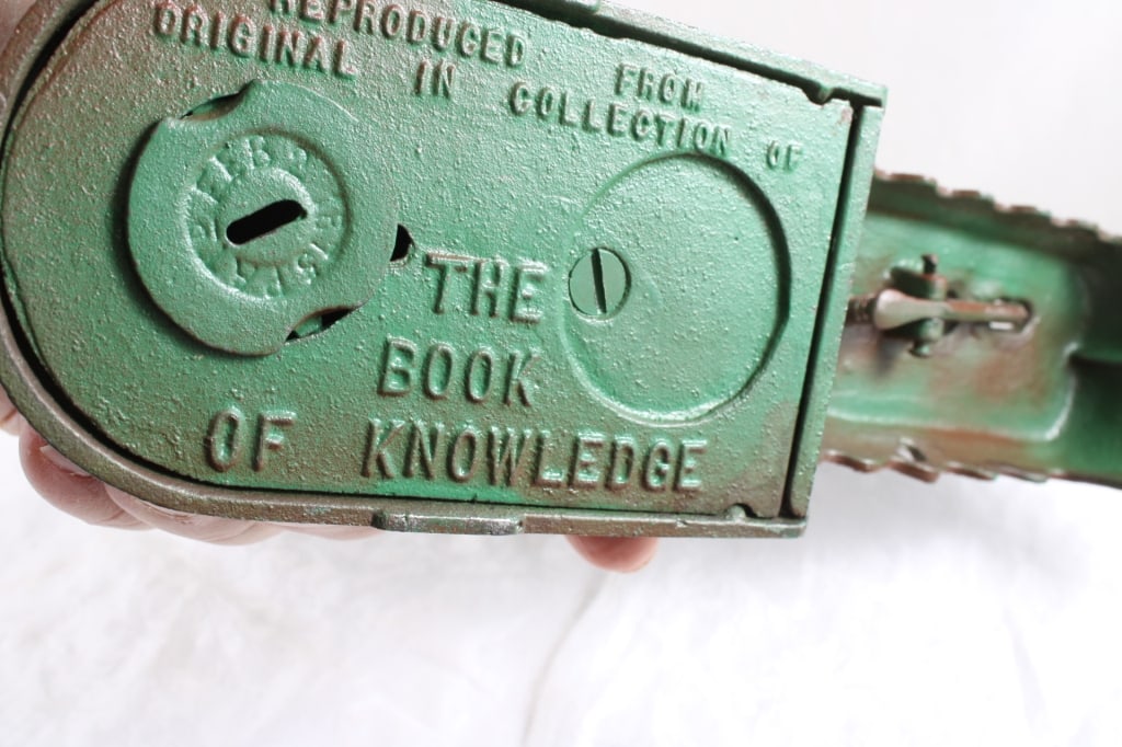 Book of Knowledge Cast Iron Mechanical Bank - 12
