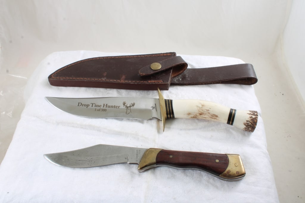 2 Fixed Blade Knives Drop Tine Hunter Ltd. Ed.: 2 Fixed Blade Knives Drop Tine Hunter Ltd. Ed. - with sheath and High Carbon Steel #2651. Lot Size 12" x 3" x 3". 2 Lbs. Photos are part of description (Live Auctioneers on displays a max of 20