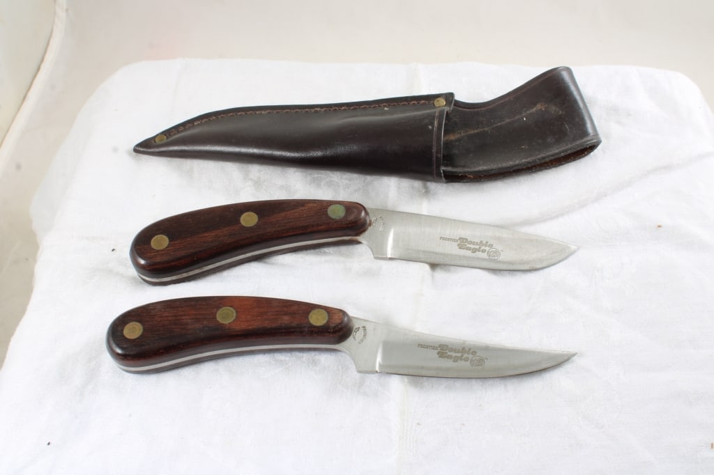 2 Imperial Frontier Double Eagle Fixed Knives: 2 Imperial Frontier Double Eagle Fixed Knives - 1 is Imperial Frontier Double Eagle with Sheath. Lot Size 10" 3" x 3". 1 Lb. Photos are part of description (Live Auctioneers on displays a max