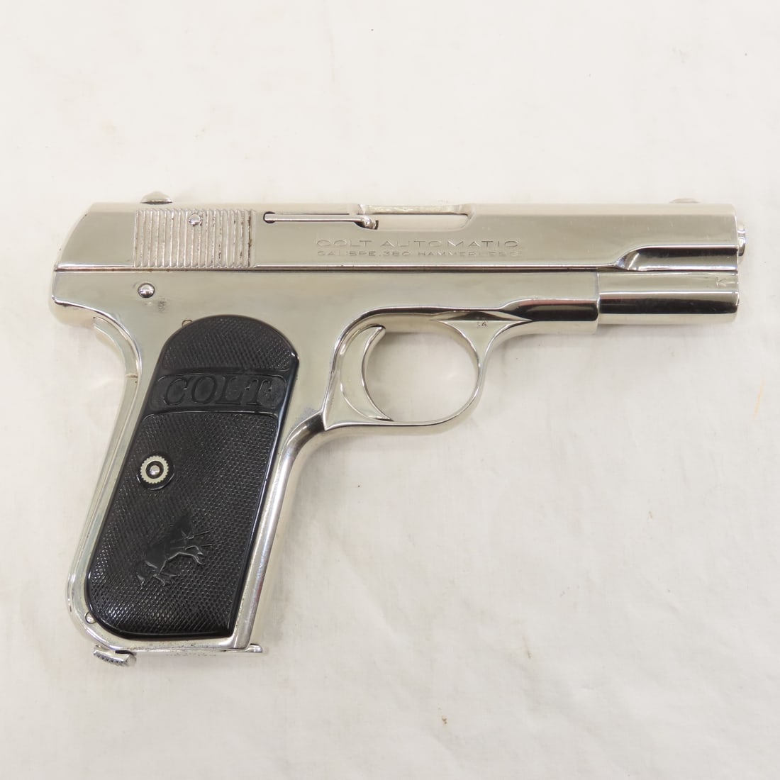 Colt 1908 Pocket Hammerless .380 Pistol: Colt 1908 Pocket Hammerless .380 Pistol - SN# 58861, 3.75" barrel, hammer is covered and hidden from view under the rear of the slide, single action, 7 round magazine, front blade and rear sight. Chec