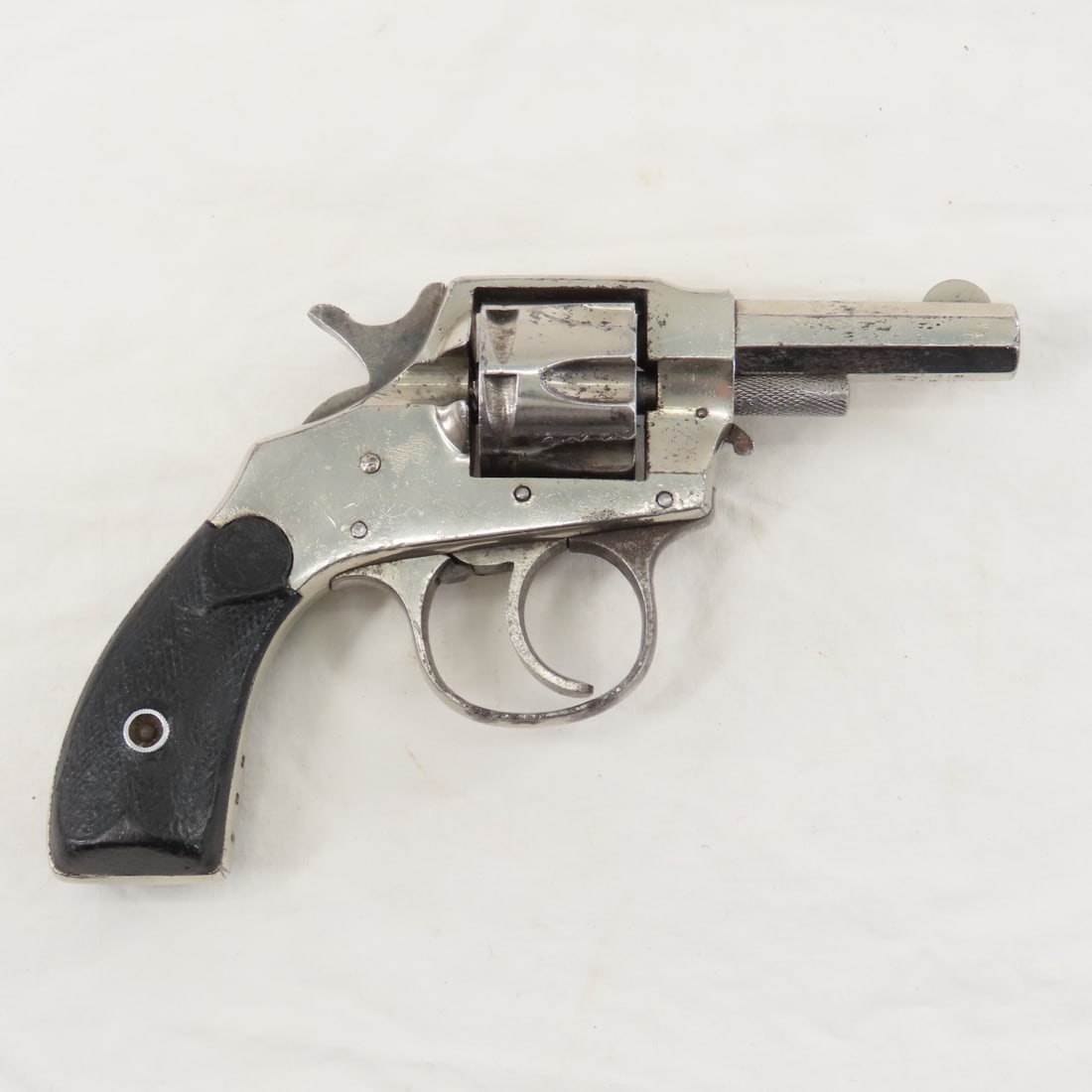 Hopkins & Allen X.L. Double Action Revolver .22: Hopkins & Allen X.L. Double Action Revolver .22 - SN# 883, 7 shot, 2.25" octagon barrel, exposed hammer, H&A checkered wood grips, C&R or FFL transfer required. Please know local laws before