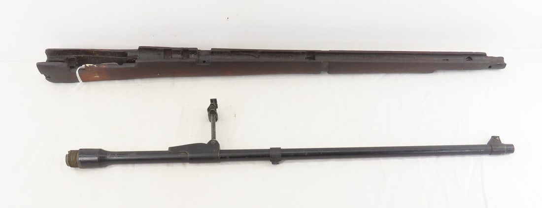 Lee Enfield .303 British Barrel & Cut Stock: Lee Enfield .303 British Barrel & Cut Stock - 25.2" barrel SN# 57675 x, front & rear sights, many proofs. stock is 30.75"- cur just behind receiver, has paint stripes and is stamped DP. LOT SIZE: