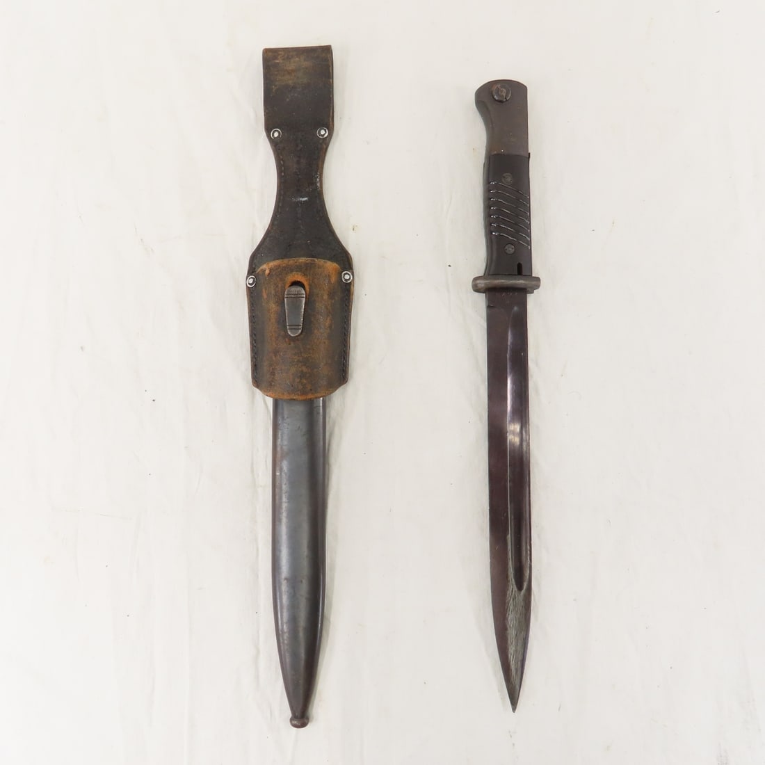 WWII Era German K98 Bayonet, Scabbard & Frog: WWII Era German K98 Bayonet, Scabbard & Frog - OAL: 15 1/8", Blade: 9 7/8", Ricasso: 42asW & 5424, Pommel: Double Waffenamt Eagle Stamps, Scabbard Throat: 5017, Finial: Waffenamt Eagle Stamp, Frog: Re