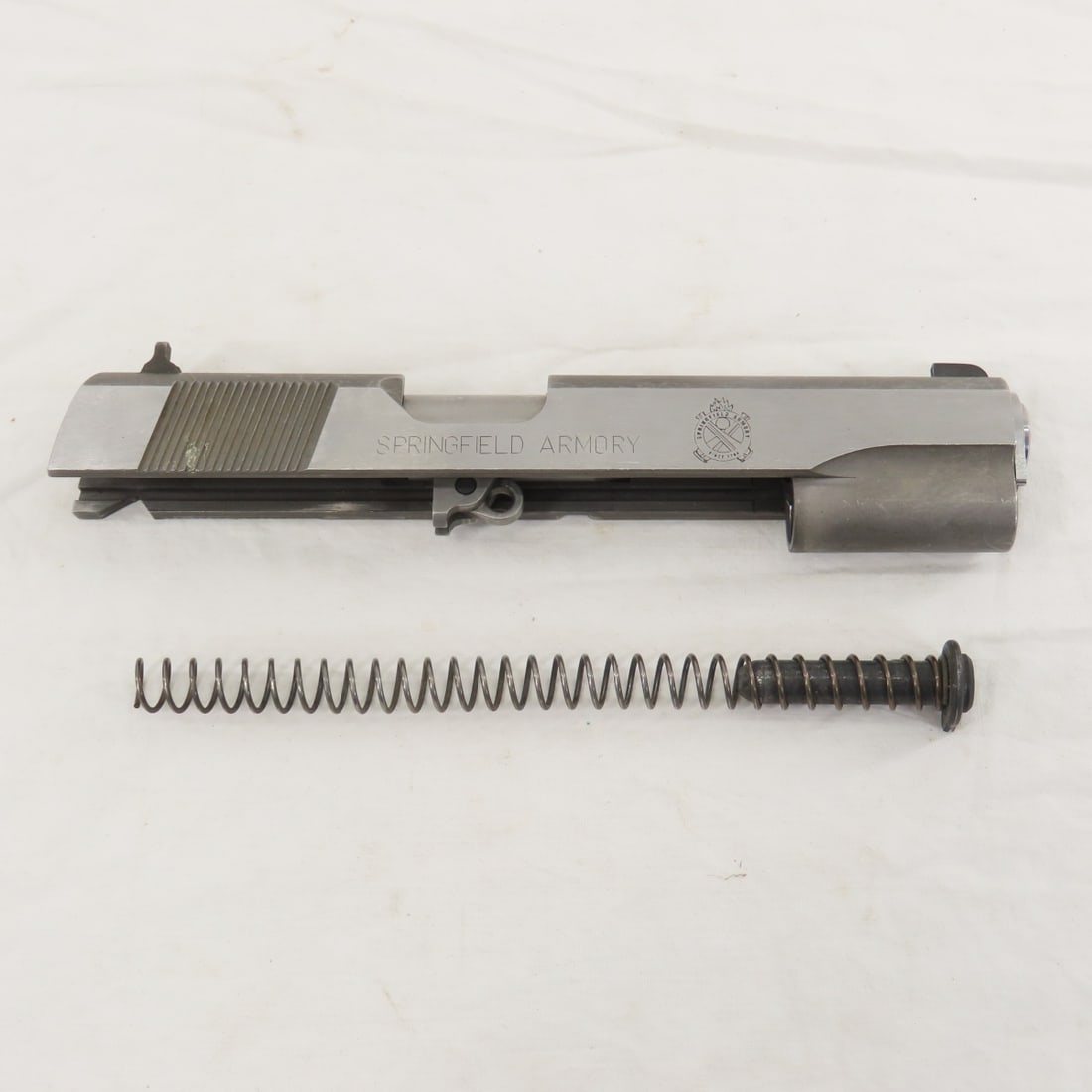 Springfield Model 1911 A1 Cal .45 Slide & Barrel: Springfield Model 1911 A1 Cal .45 Slide & Barrel - with spring. Lot Size 8x4x4" 5 LB All information and photos are intended to be as accurate as possible, but errors are possible. No item may be retu