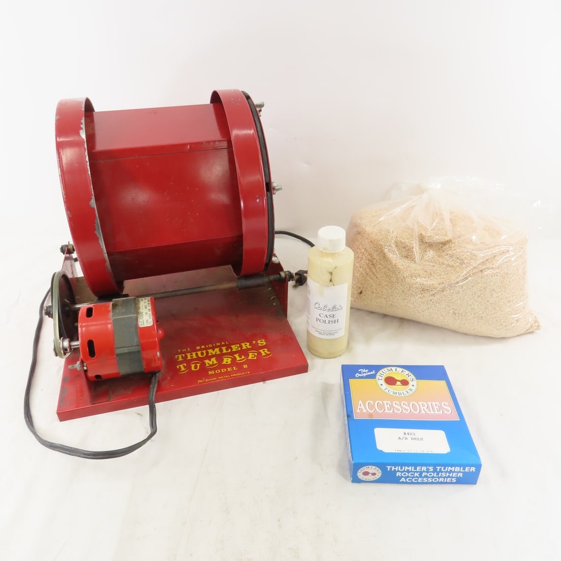 Thumler's Tumbler Model B for Rocks/Brass: Thumler's Tumbler Model B for Rocks/Brass - Tested, Working. Comes with 5 lbs Corn Media and Partial bottle of Brass Case Polish. Lot Size: 20 x 14 x 12", 19 lbs All information and photos are