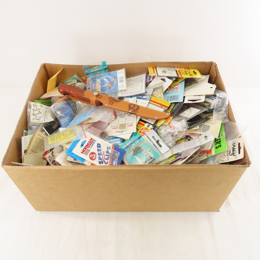 10+ lbs Fishing Hooks, Panfish Lures, Fillet Knife: 10+ lbs Fishing Hooks, Panfish Lures, Fillet Knife - & more. Lot Size: 19 x 14 x 9", 13 lbs All information and photos are intended to be as accurate as possible, but errors are possible. No item may